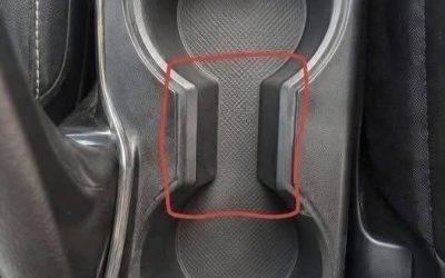 What Is the Weird Gap Between Car Cup Holders For???